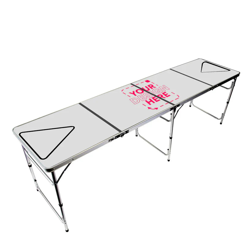 Close-up of a custom beer pong table with bold full-color branding, set with triangular cup racks under event lighting.