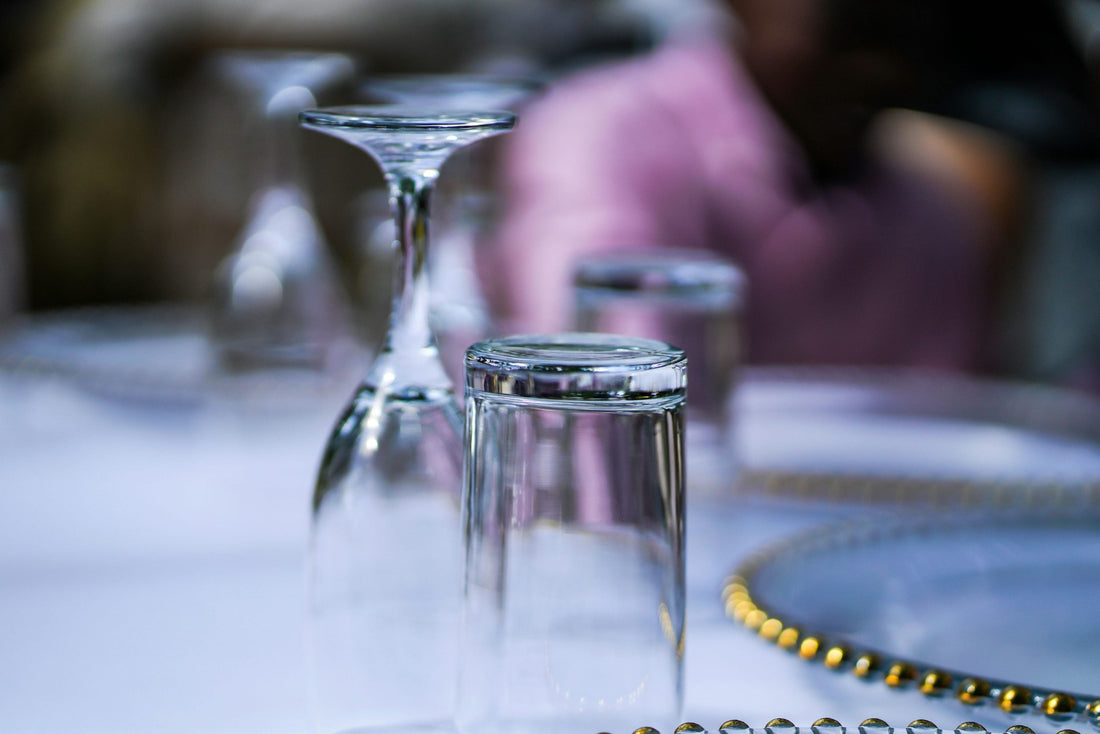 2 glasswares upside down on the table of a resturant