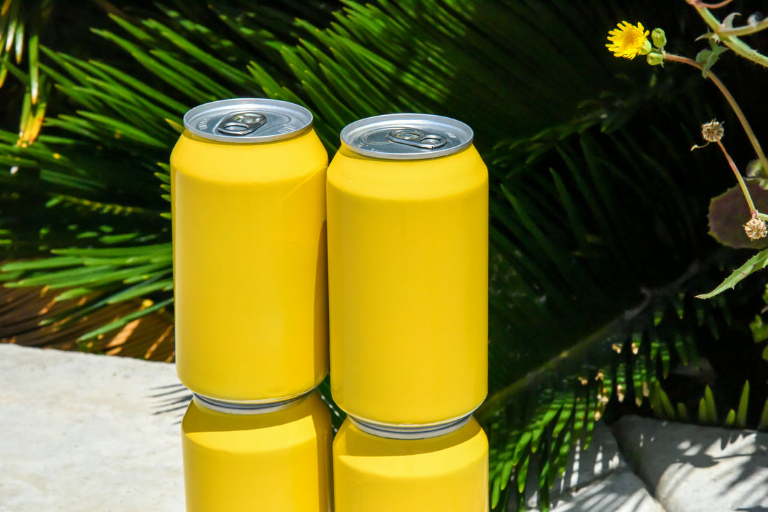 2 yellow koozies on a Pepsi can